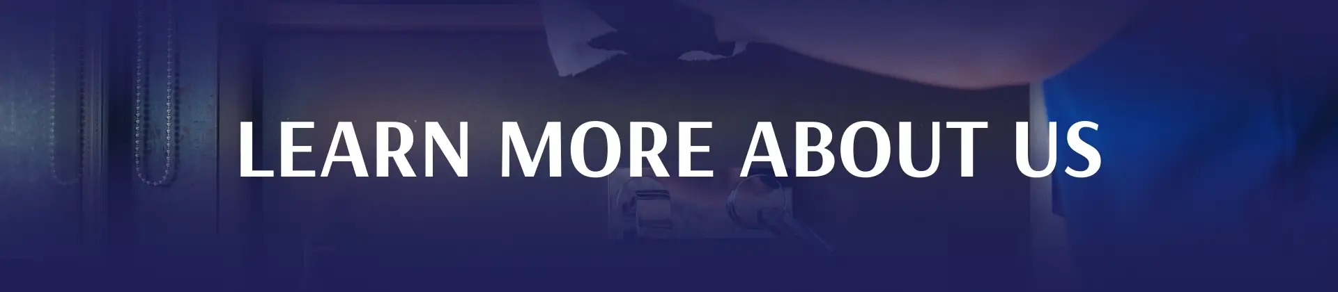 A person working with tools; overlaid text reads "Learn More About Us.